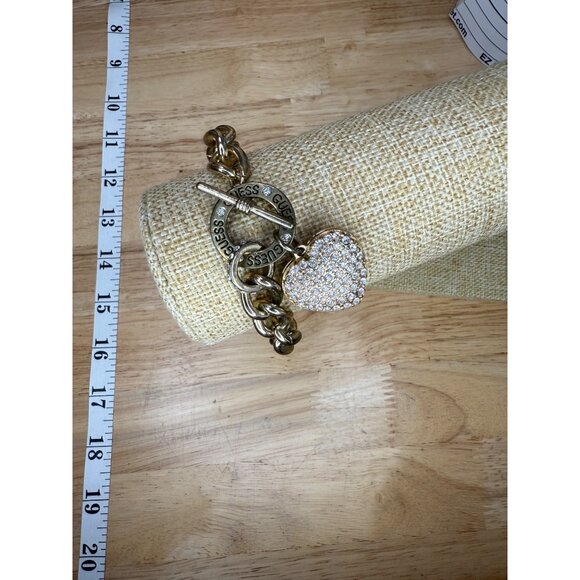 Guess Gold-Tone Chain-Link Toggle Bracelet With Pave Crystal Heart Charm - Picture 13 of 13